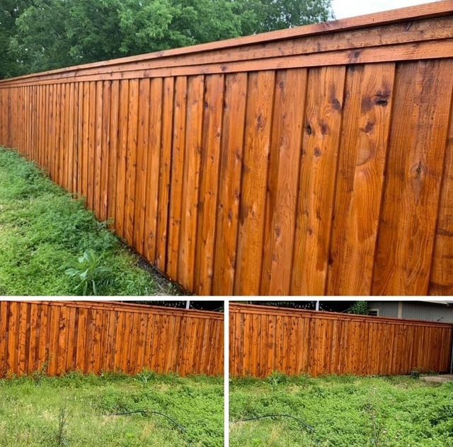 Long board-on-board cedar fence freshly stained a rich red-brown